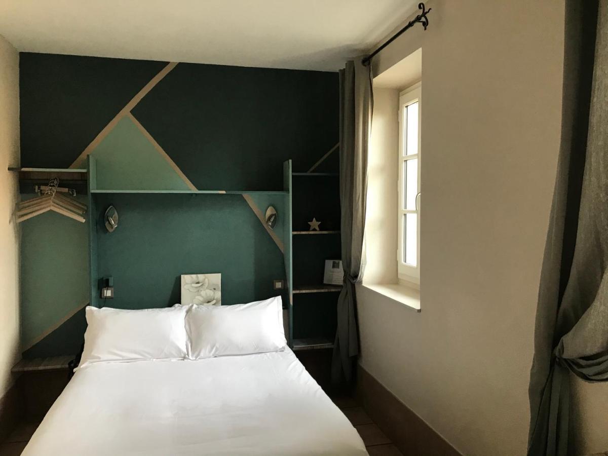 Hotel Des Bains Figeac Bagian luar foto
