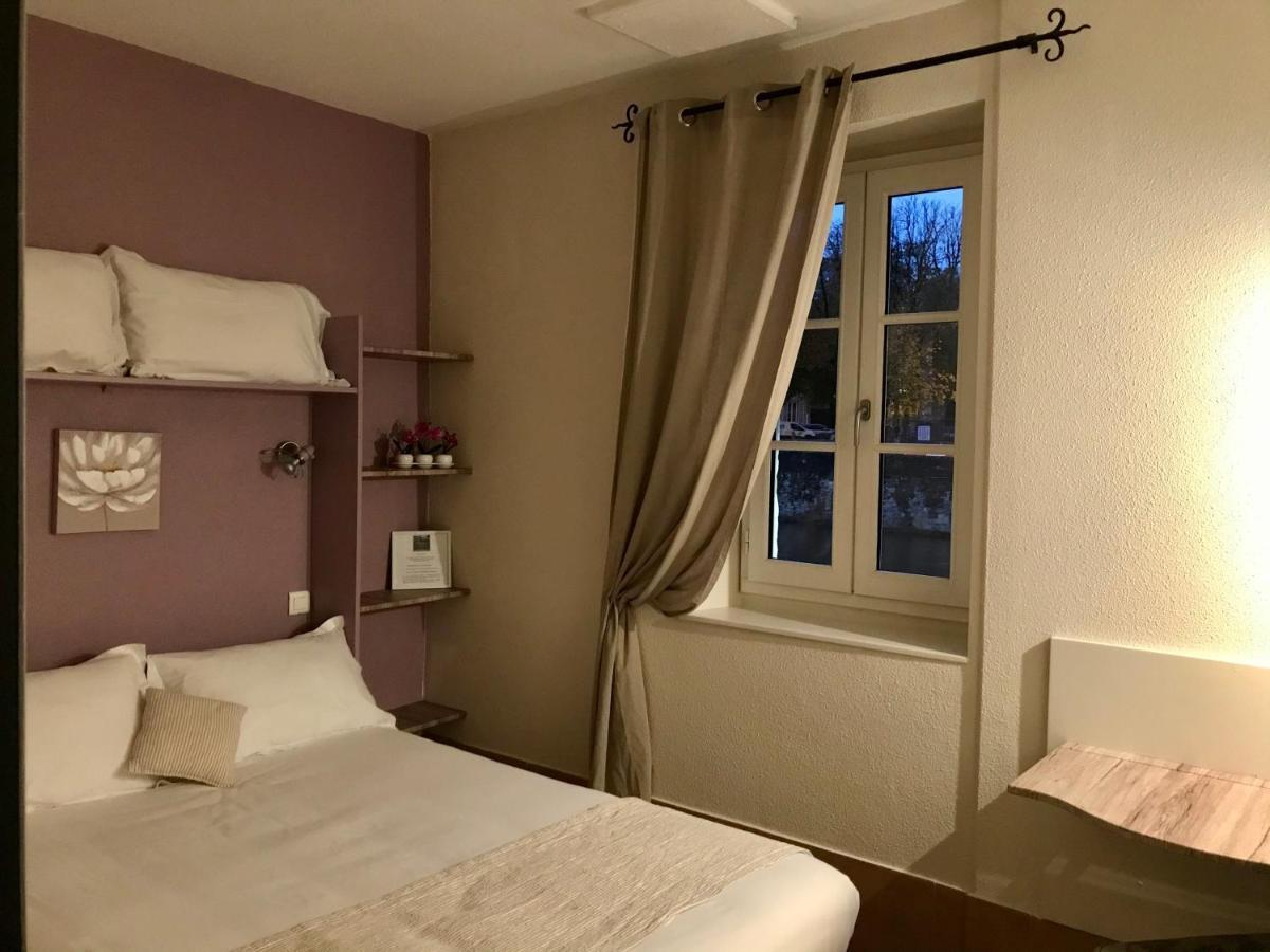 Hotel Des Bains Figeac Bagian luar foto